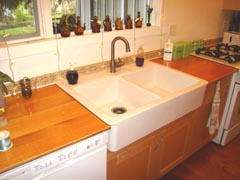 Installation of a Farm Sink and garbage disposal by B.B.C. Plumbing